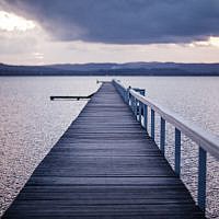 Jetty under a stormy sky